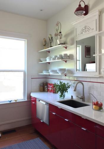 A mix of modern and vintage style: Small kitchen in a historic building